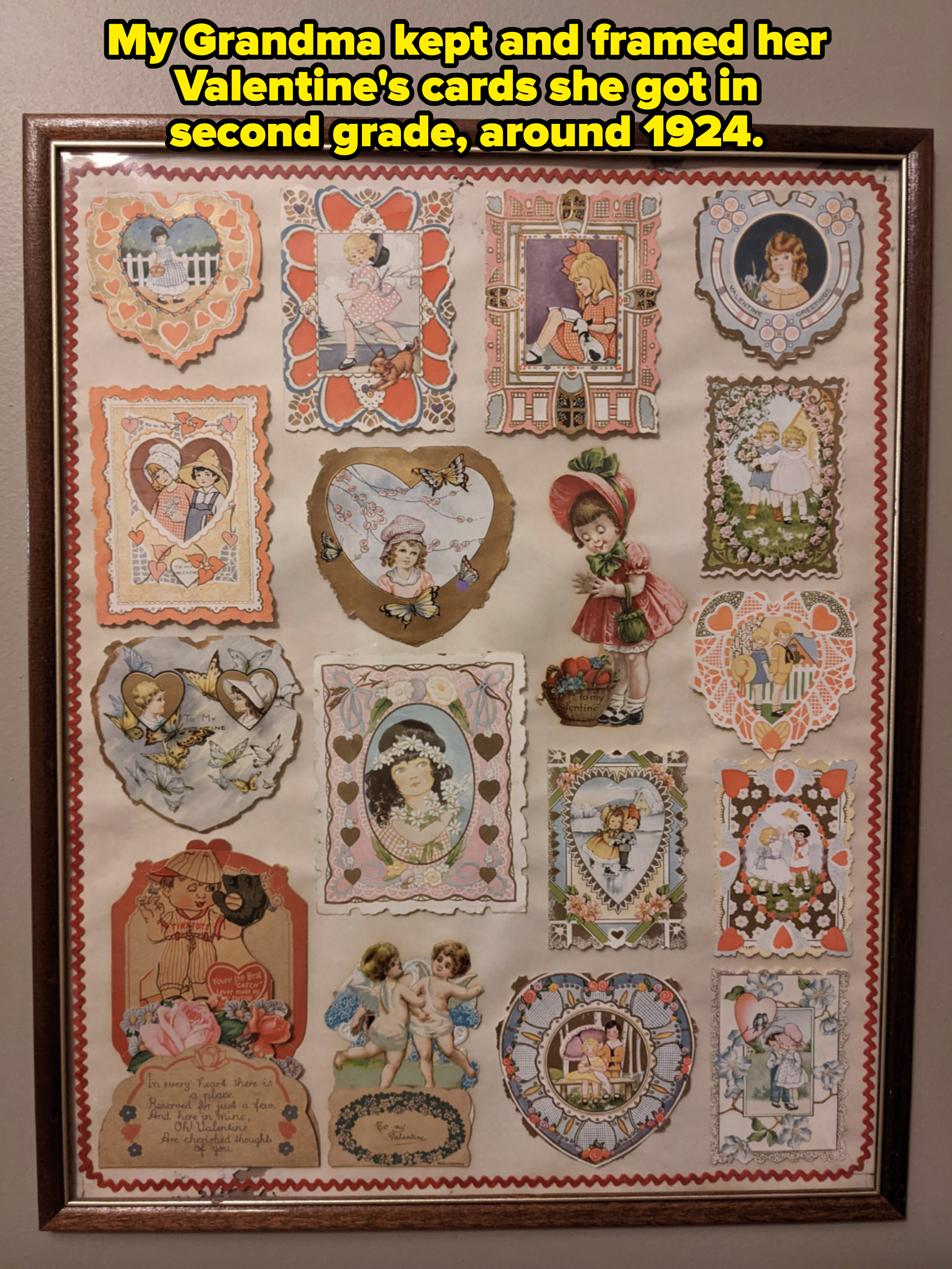 A framed collage of vintage Valentine's Day cards featuring various romantic and whimsical illustrations, including children, hearts, flowers, and love messages