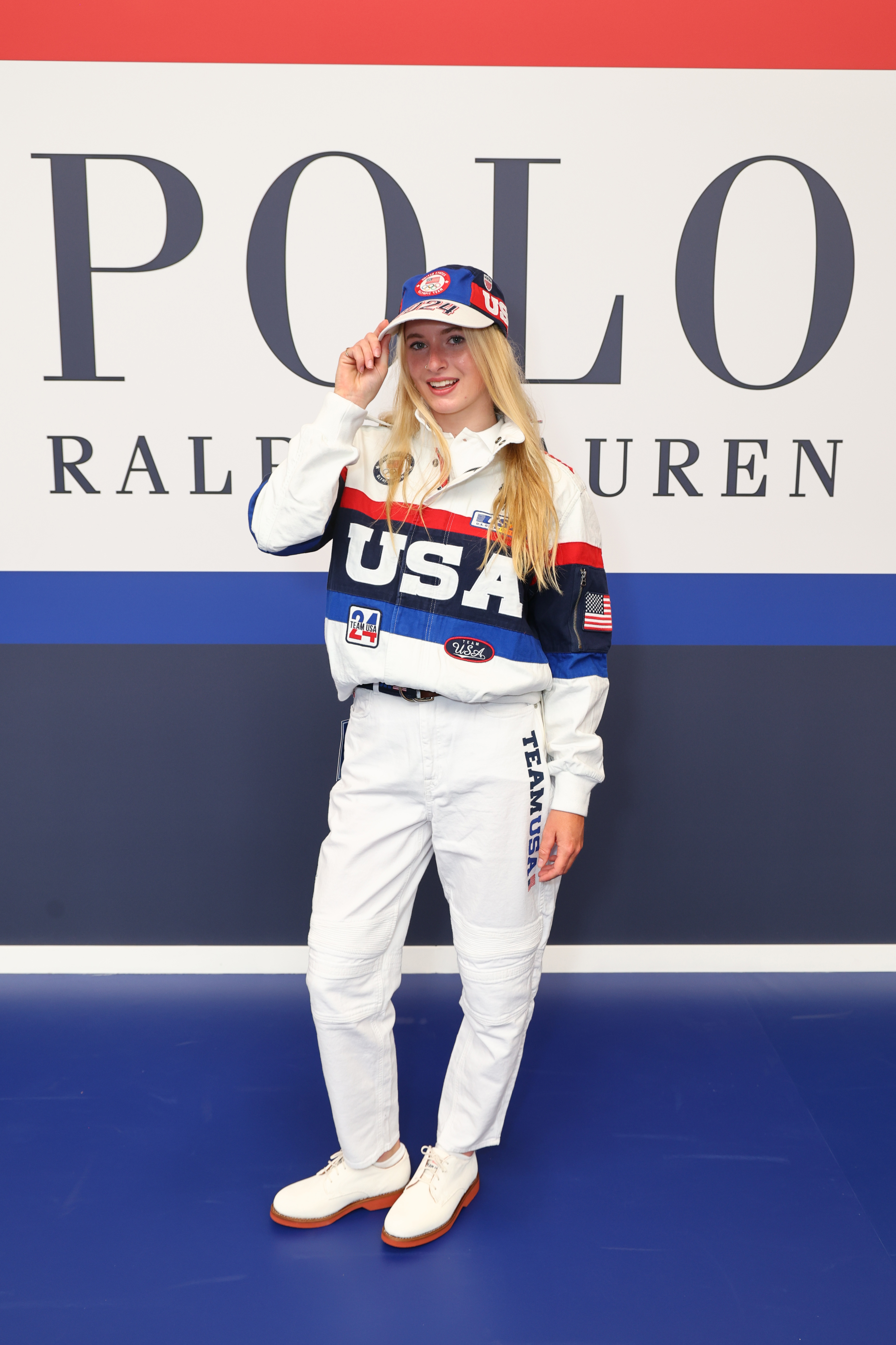 Megan Rapinoe wearing a sporty USA-themed outfit and hat at a Polo Ralph Lauren event