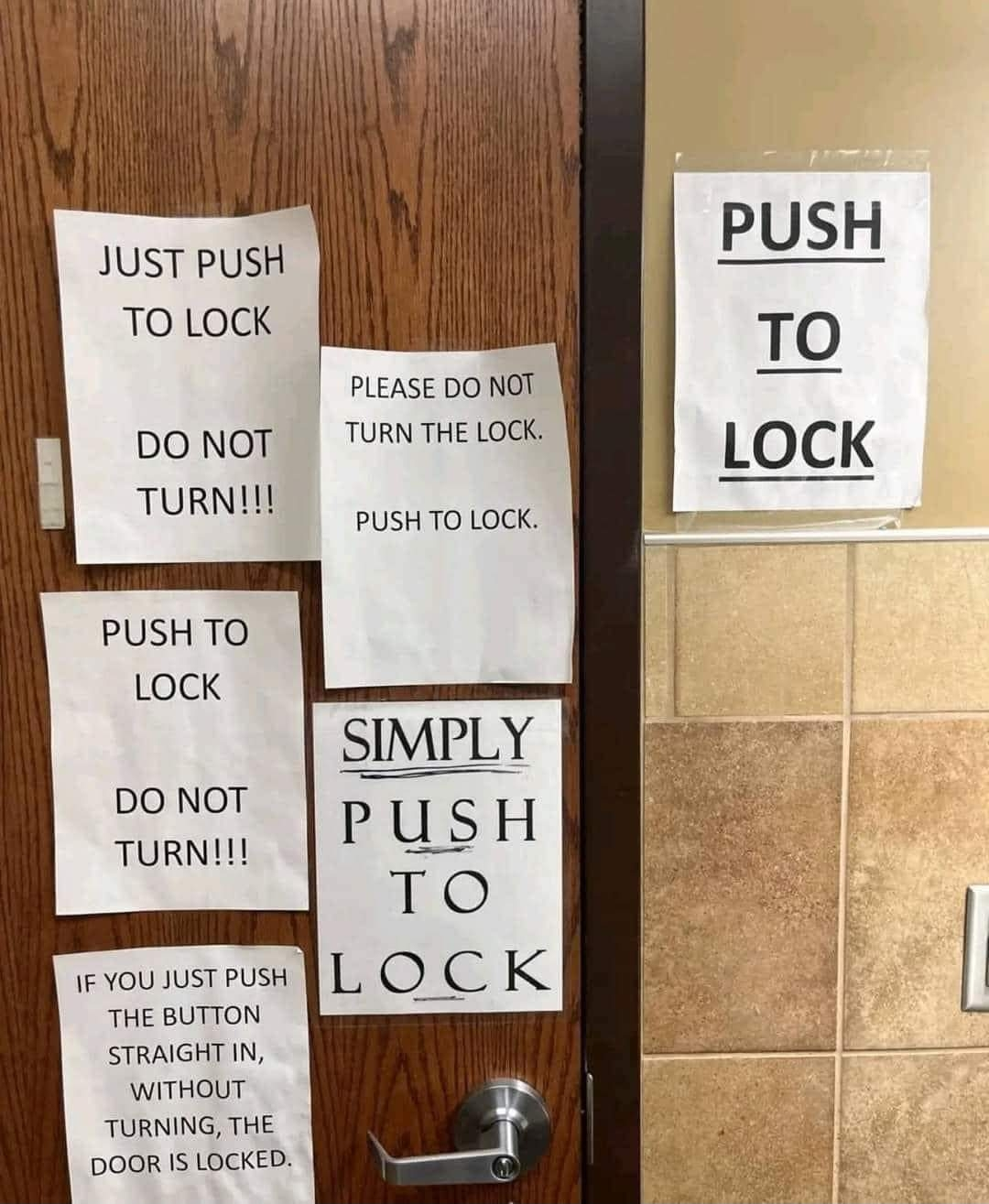 Multiple signs on a door with instructions to "Push to Lock" and "Do Not Turn" the lock