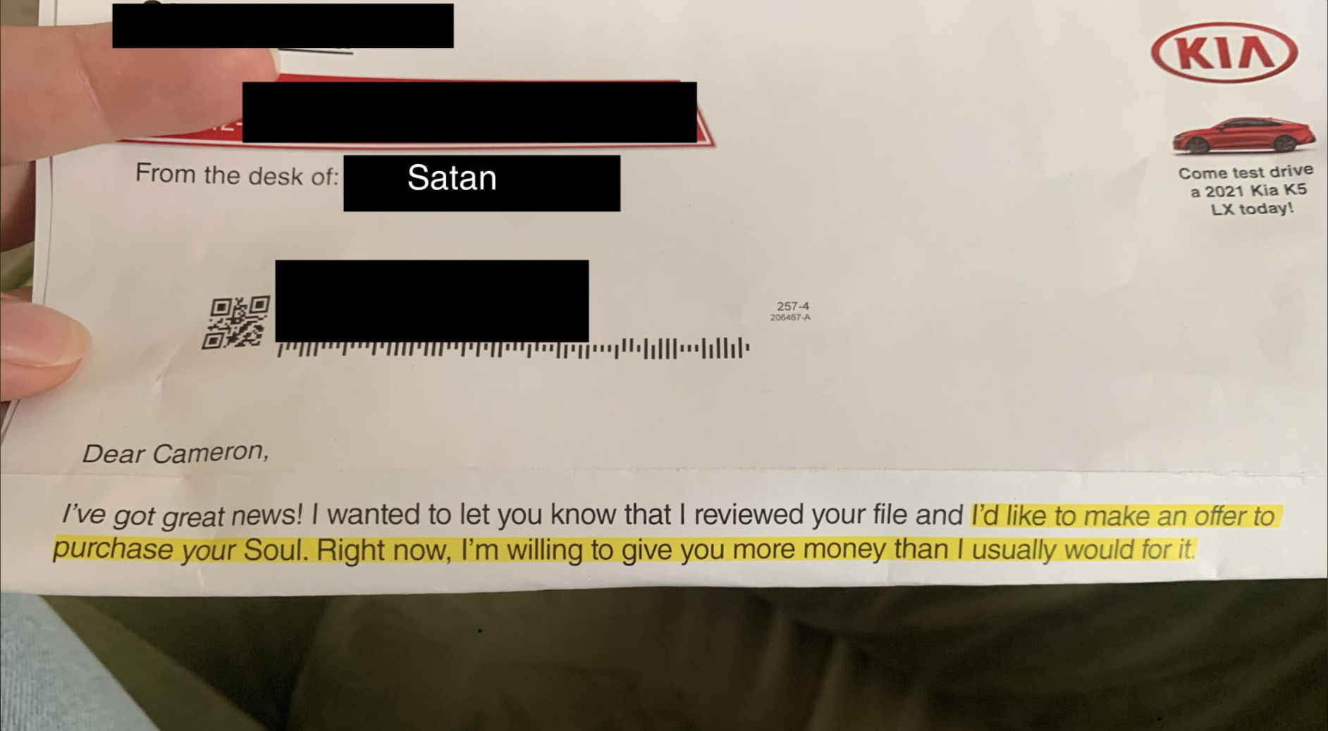A letter from "Satan" offering to purchase the recipient's soul, with a highlighted section indicating a higher than usual offer. The letterhead is from a Kia dealership