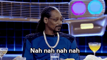 Snoop Dogg in a TV show scene, wearing a chain necklace and dark shirt, looks to the side. Text overlay says, &quot;Nah nah nah nah.&quot;