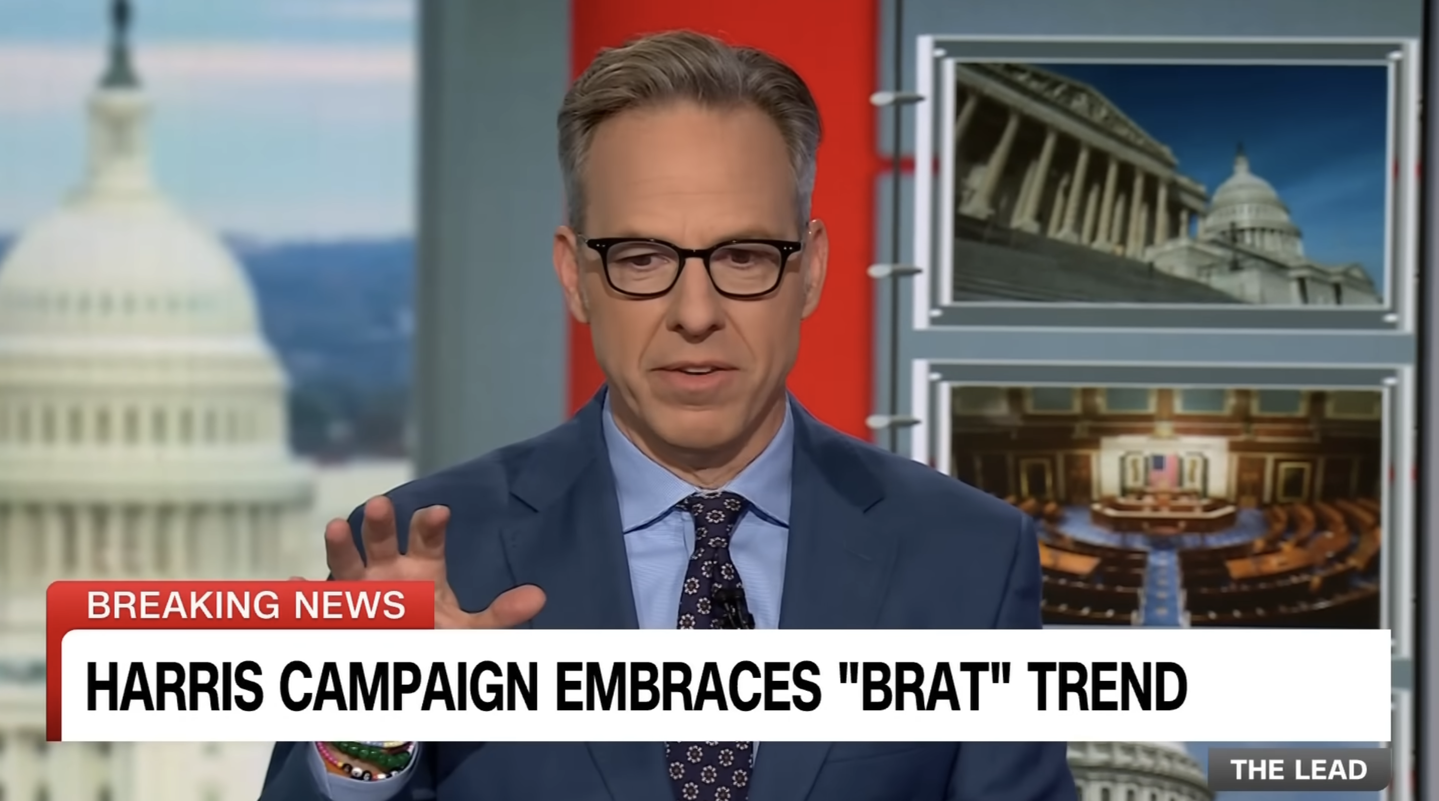 Jake Tapper on a news set discussing a headline: &quot;Harris Campaign Embraces 'Brat' Trend.&quot; Images of U.S. Capitol building and Senate chamber in the background