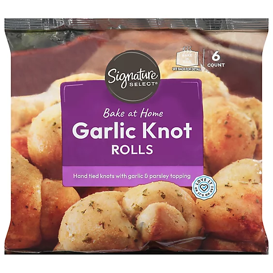 Package of Signature Select's Bake at Home Garlic Knot Rolls; the bag shows six garlic knots with garlic and parsley topping