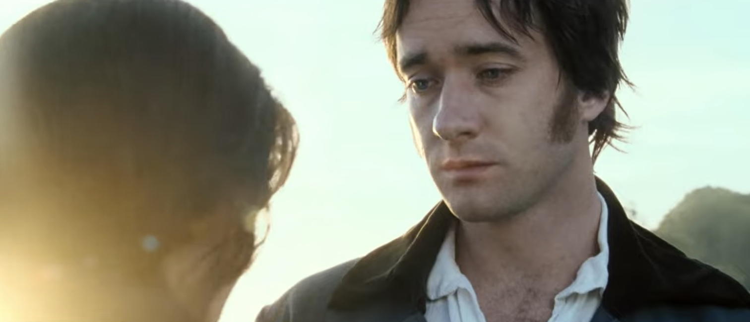 Elizabeth Bennet and Mr. Darcy in what looks like an emotional outdoor scene from the movie "Pride and Prejudice." Darcy is facing Lizzy, who has her back to the camera