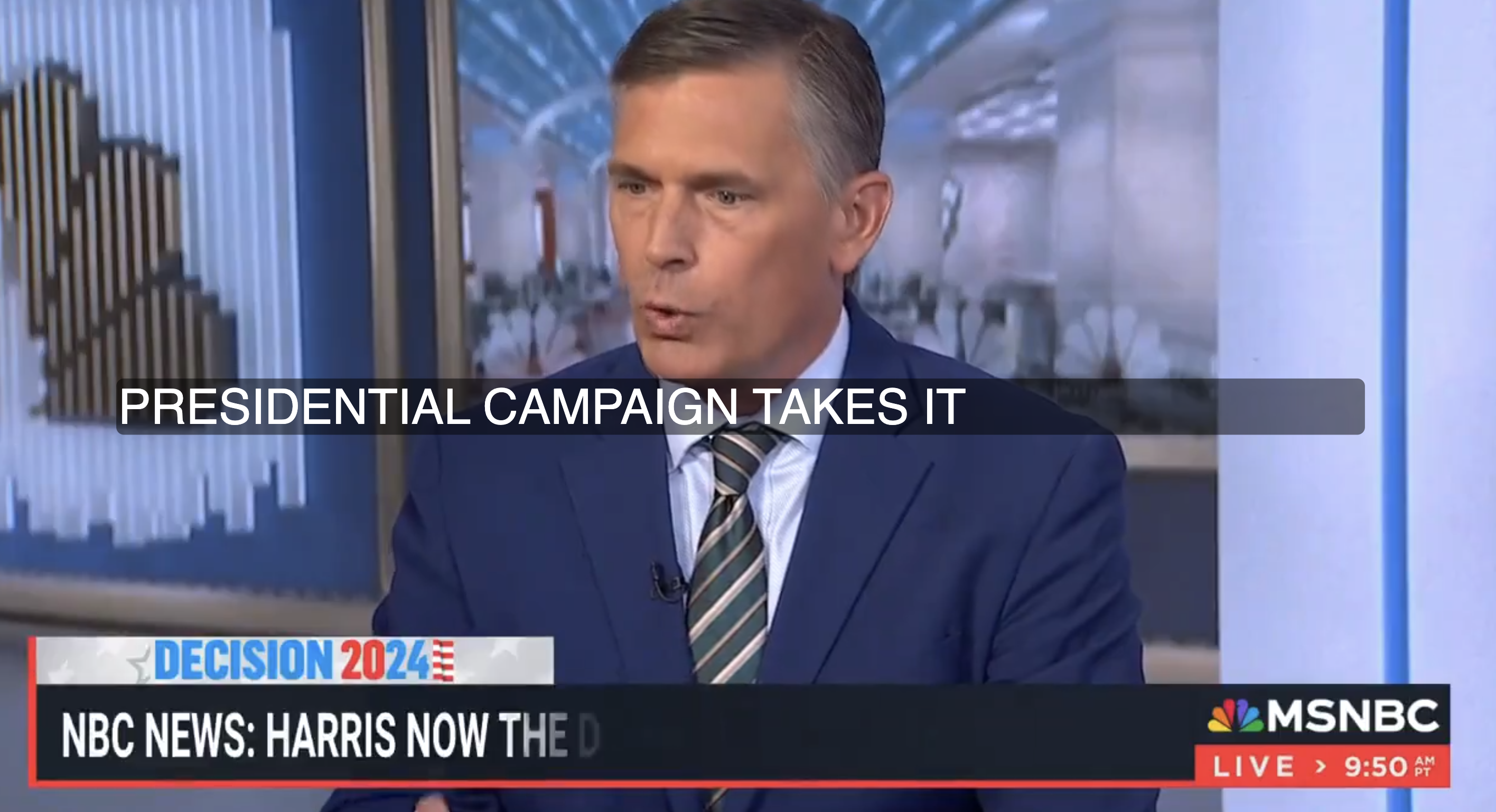A man in a blue suit and striped tie speaks on an MSNBC news broadcast about a presidential campaign. The screen reads, &quot;NBC News: Harris Now the D&hellip;&quot;