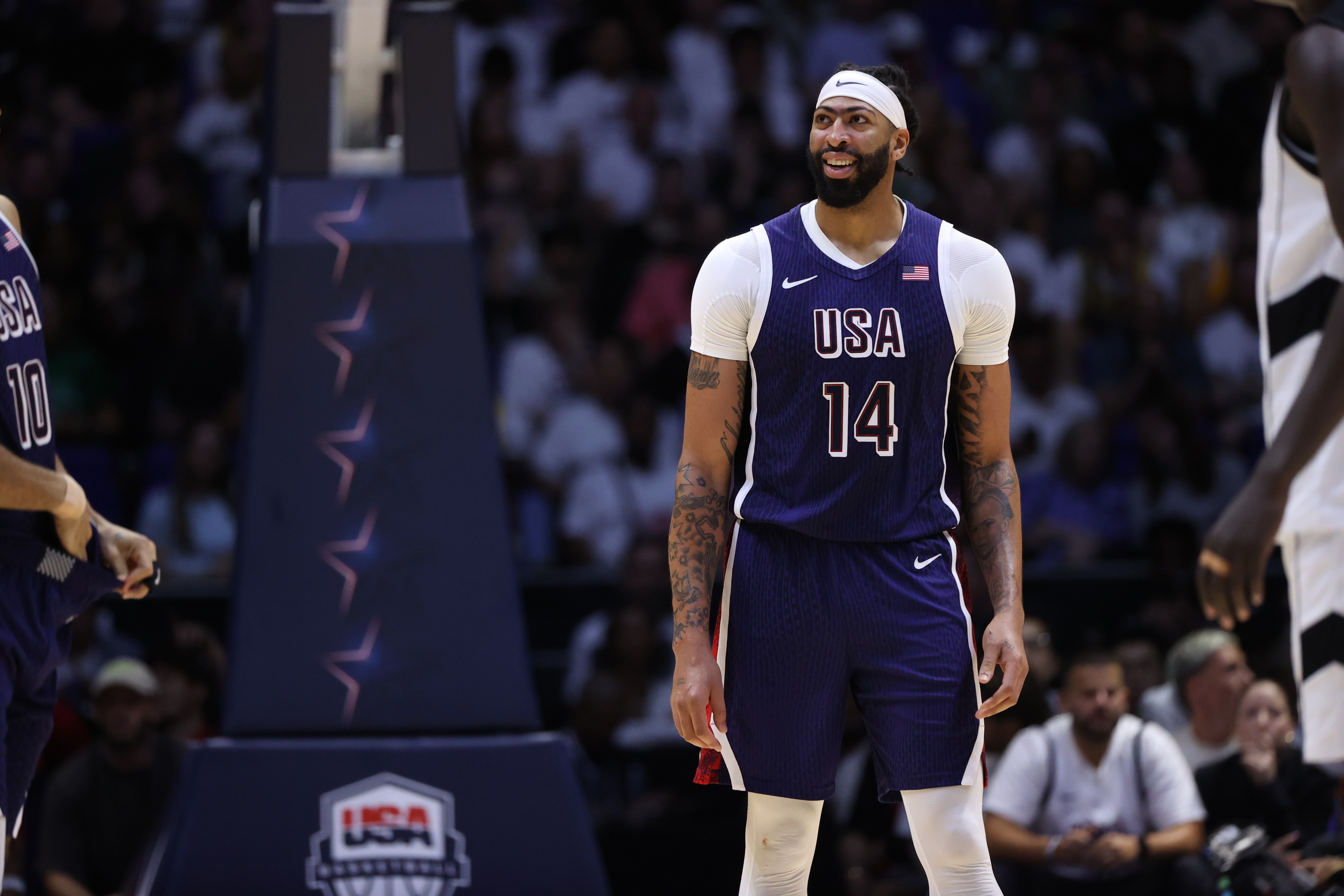 Anthony Davis on the basketball court in a Team USA jersey with number 14, during a game