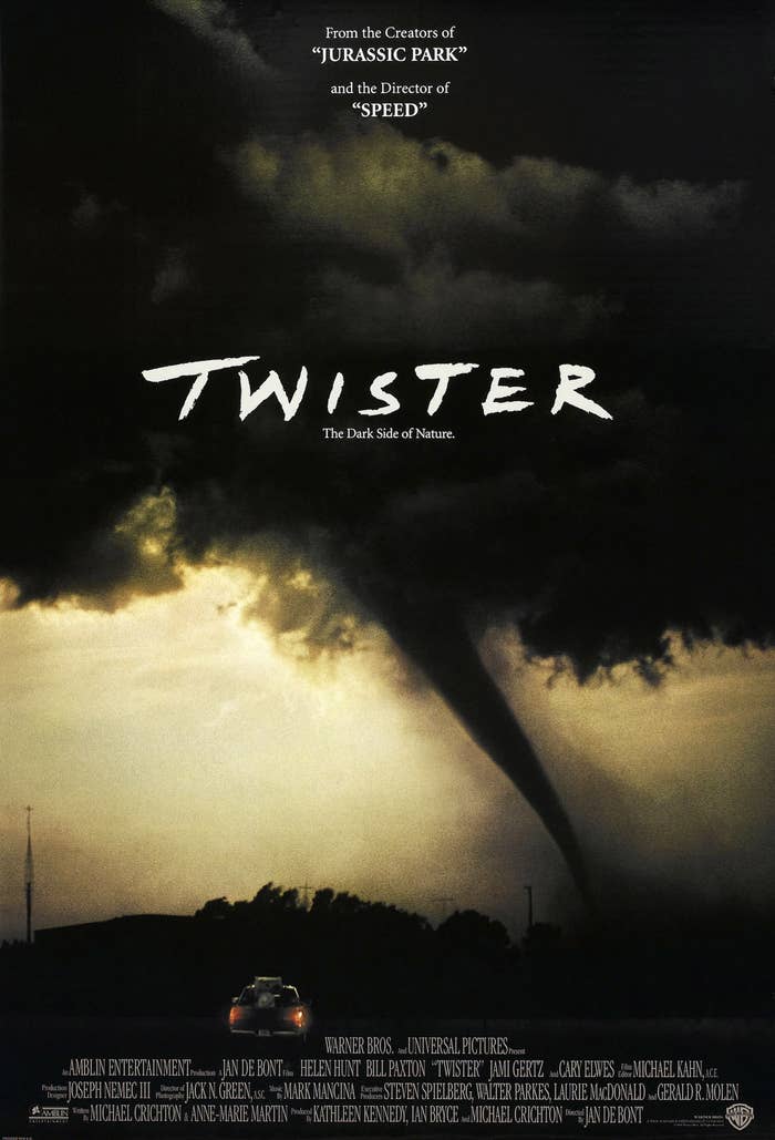 Movie poster for "Twister" showing a tornado approaching a road with a car driving toward it. The tagline is "The Dark Side of Nature."