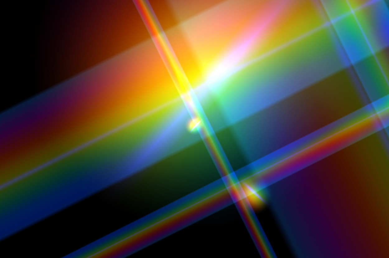 An abstract art piece featuring intersecting diagonal lines with a spectrum of colors and light effects against a dark background