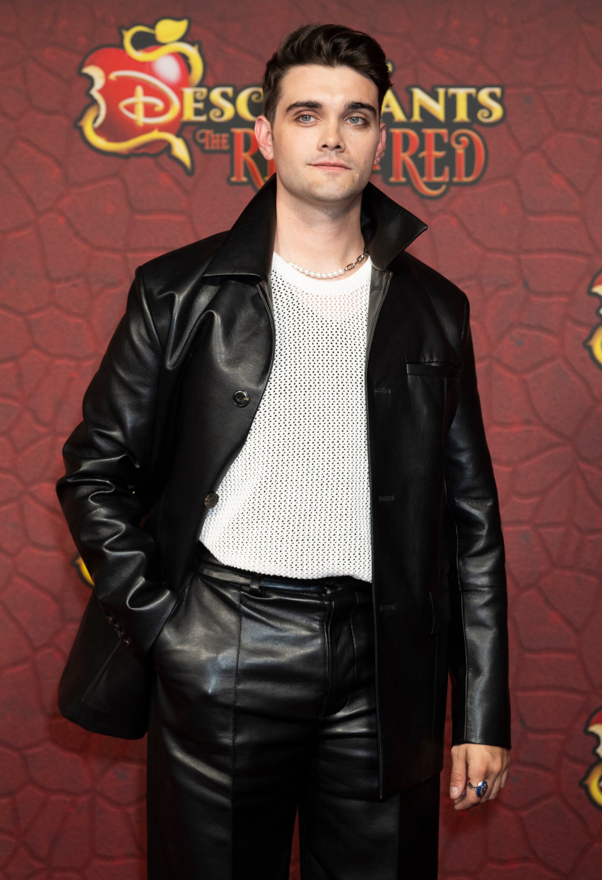 Anthony Pyatt on the red carpet for "Descendant: The Rise of Red" in a leather outfit