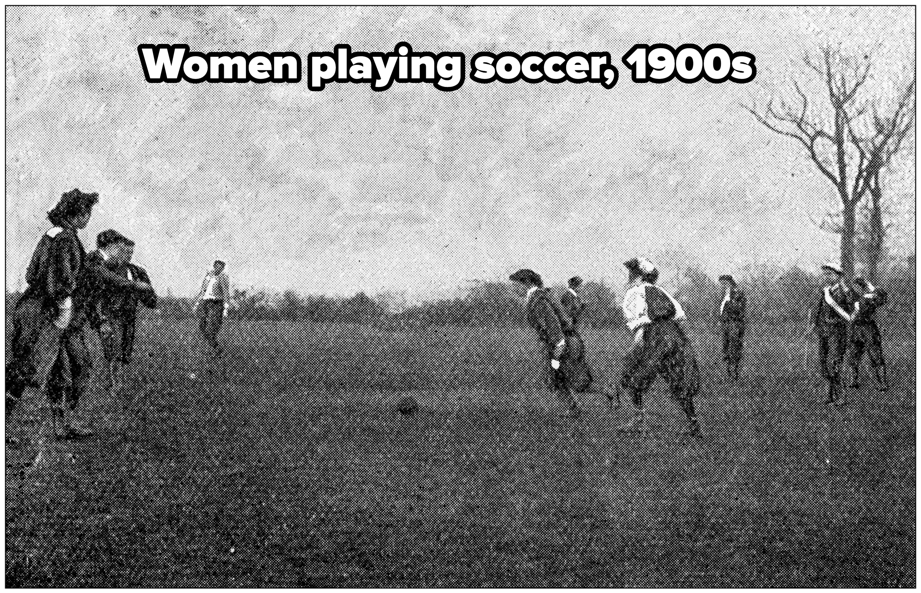 Several women are playing a game resembling football on a field with trees in the background