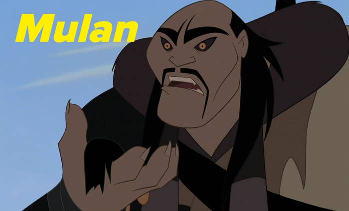 Animated character Shan Yu from Mulan angrily reaches forward with his right hand, his face showing frustration or anger