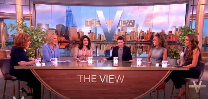 Joy Behar, Sara Haines, Alyssa Farah Griffin, Elliot Page, Sunny Hostin, and Ana Navarro at The View talk show set