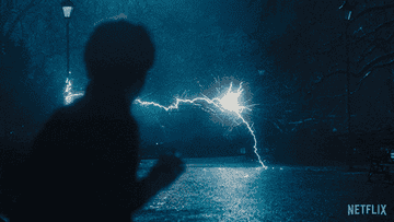 A mysterious figure traveling through a portal in &quot;Supacell&quot;