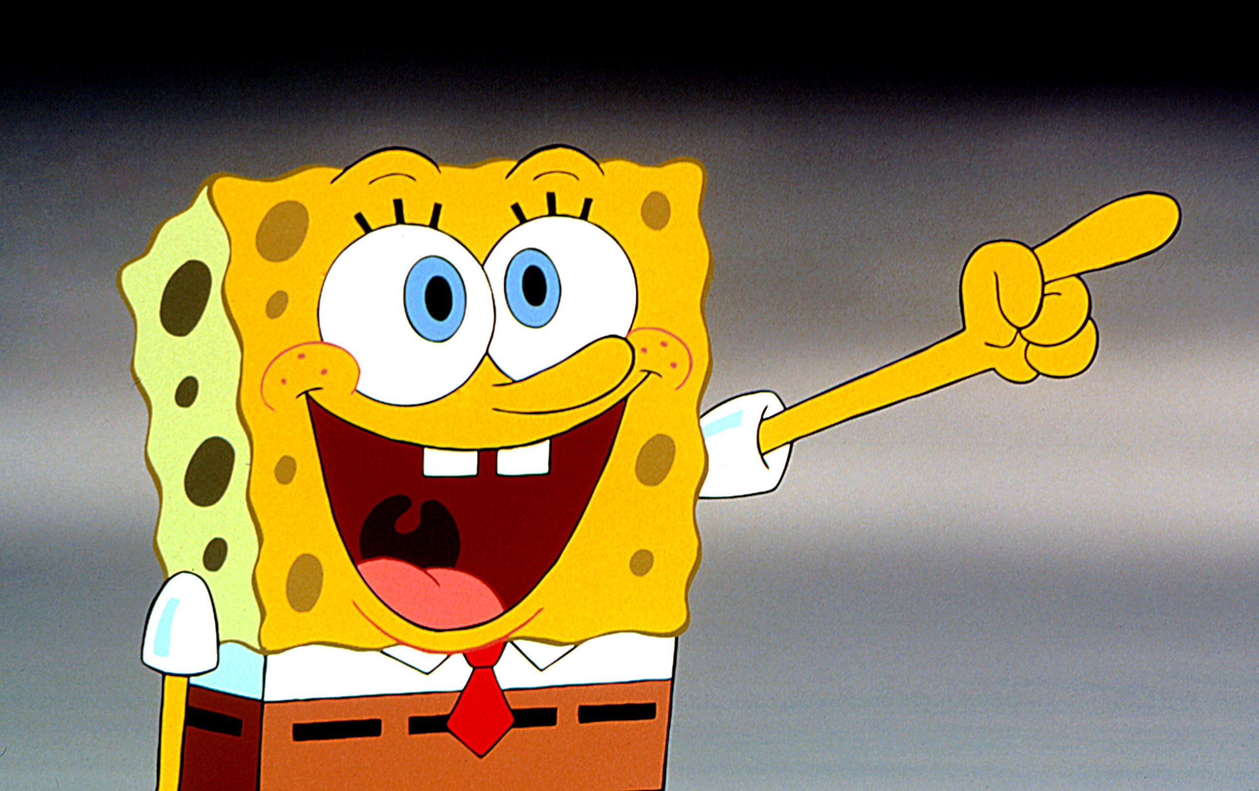 SpongeBob SquarePants character pointing and smiling enthusiastically
