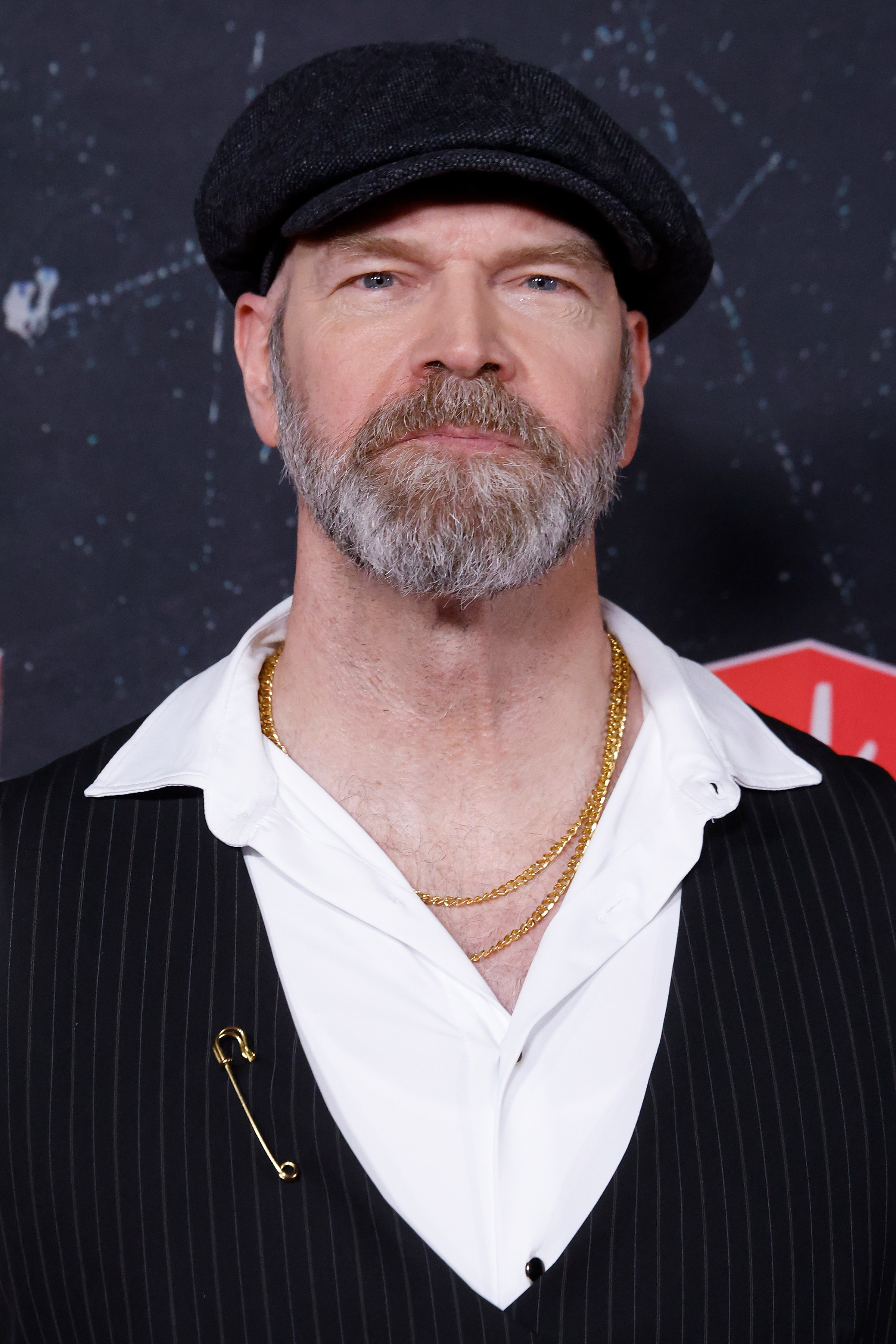 Tyler Mane in a cap, vest, and white shirt at the &quot;Deadpool &amp;amp; Wolverine&quot; world premiere