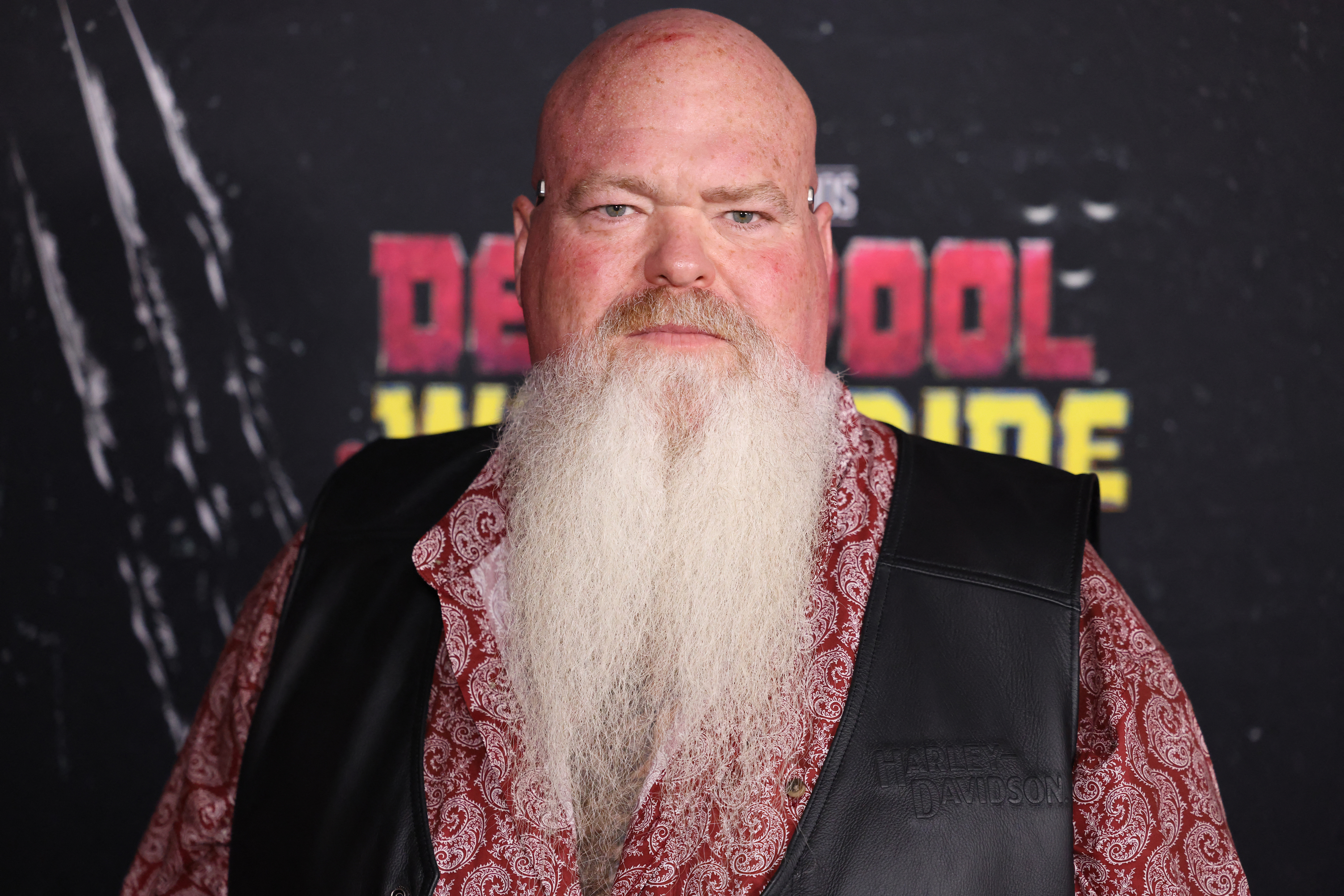 Randal Reeder in a button-up shirt and vest at the &quot;Deadpool &amp;amp; Wolverine&quot; world premiere