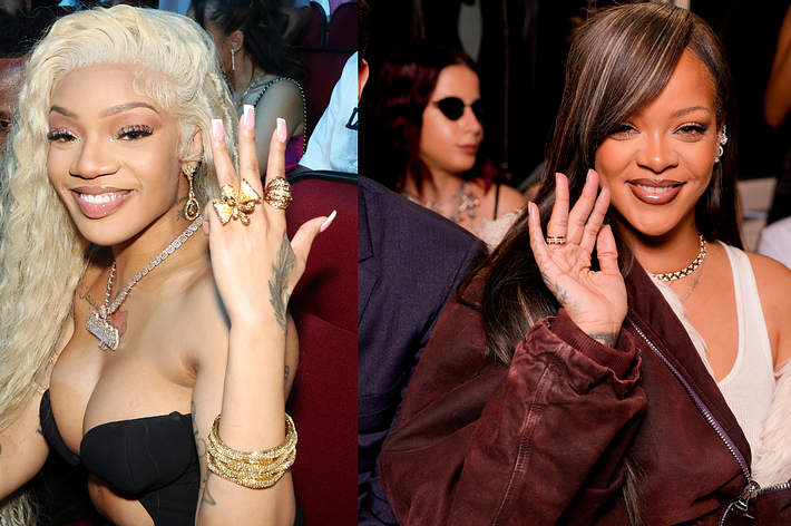 GloRilla and Rihanna smiling and waving to the camera at a music event. GloRilla wears a black top and jewelry, while Rihanna wears a brown outfit with a pearl necklace