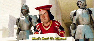 Lord Farquaad, flanked by two armored knights, exclaims, "What's that? It's hideous!" This scene is from the animated movie Shrek