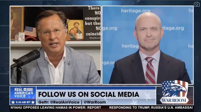 Dave Brat and Kevin D Roberts on a split screen during a Real America's Voice broadcast discussing social media