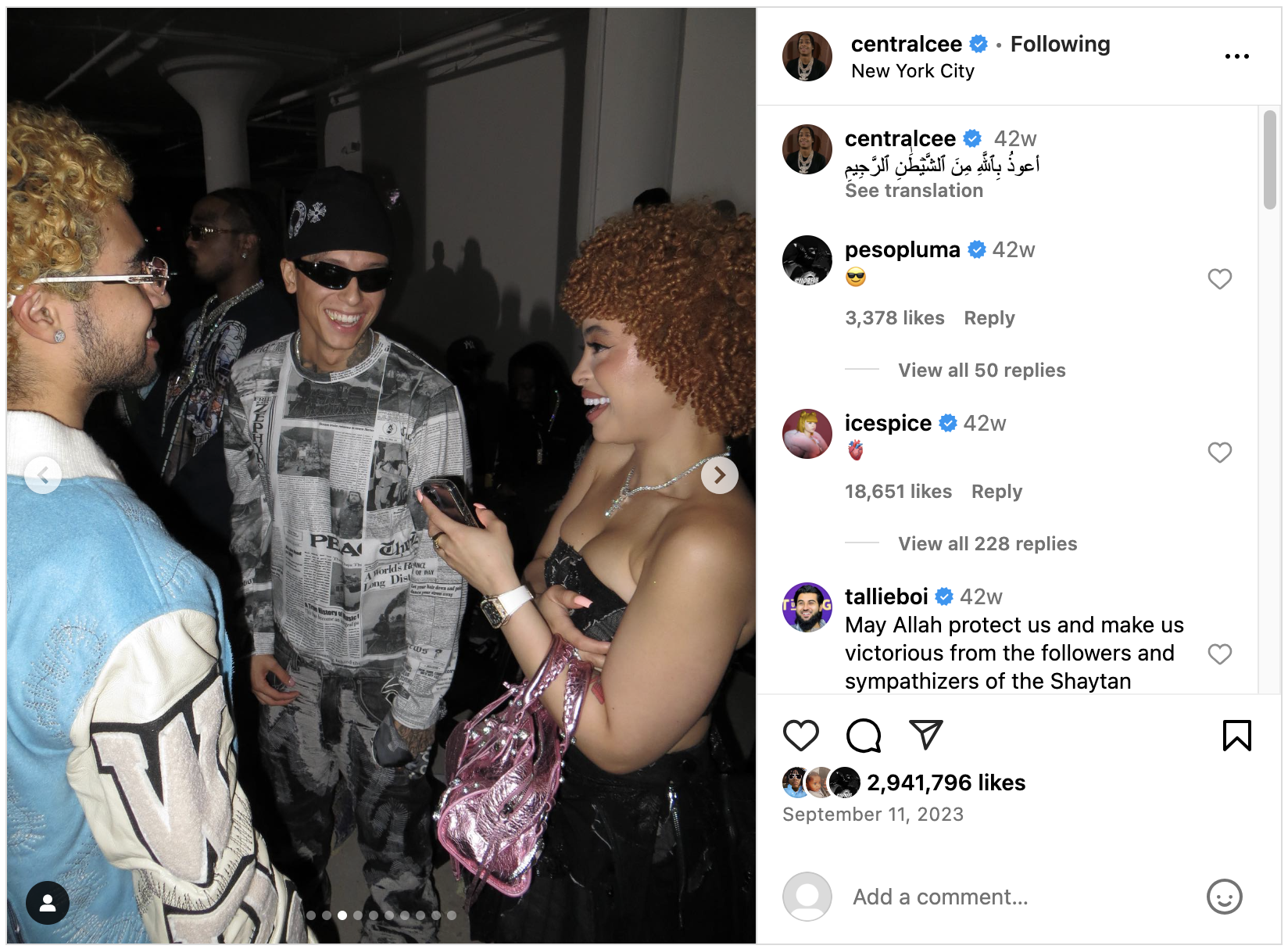 Central Cee smiles while wearing a graphic outfit, talking to Ice Spice and RIOTUSA in this Instagram post