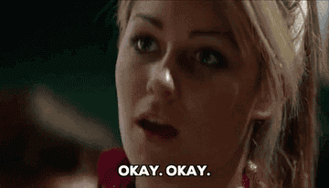 A young woman is shown saying, &quot;OKAY. OKAY.&quot;