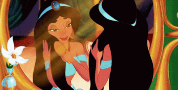Princess Jasmine from "Aladdin" brushing her hair in front of a mirror.