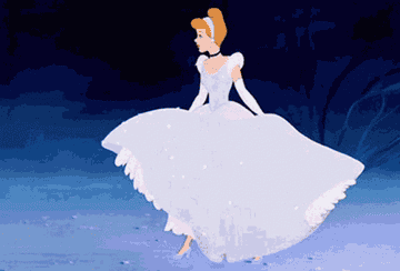 Cinderella twirls in her sparkling ball gown, looking graceful and happy in this animated scene from "Cinderella."