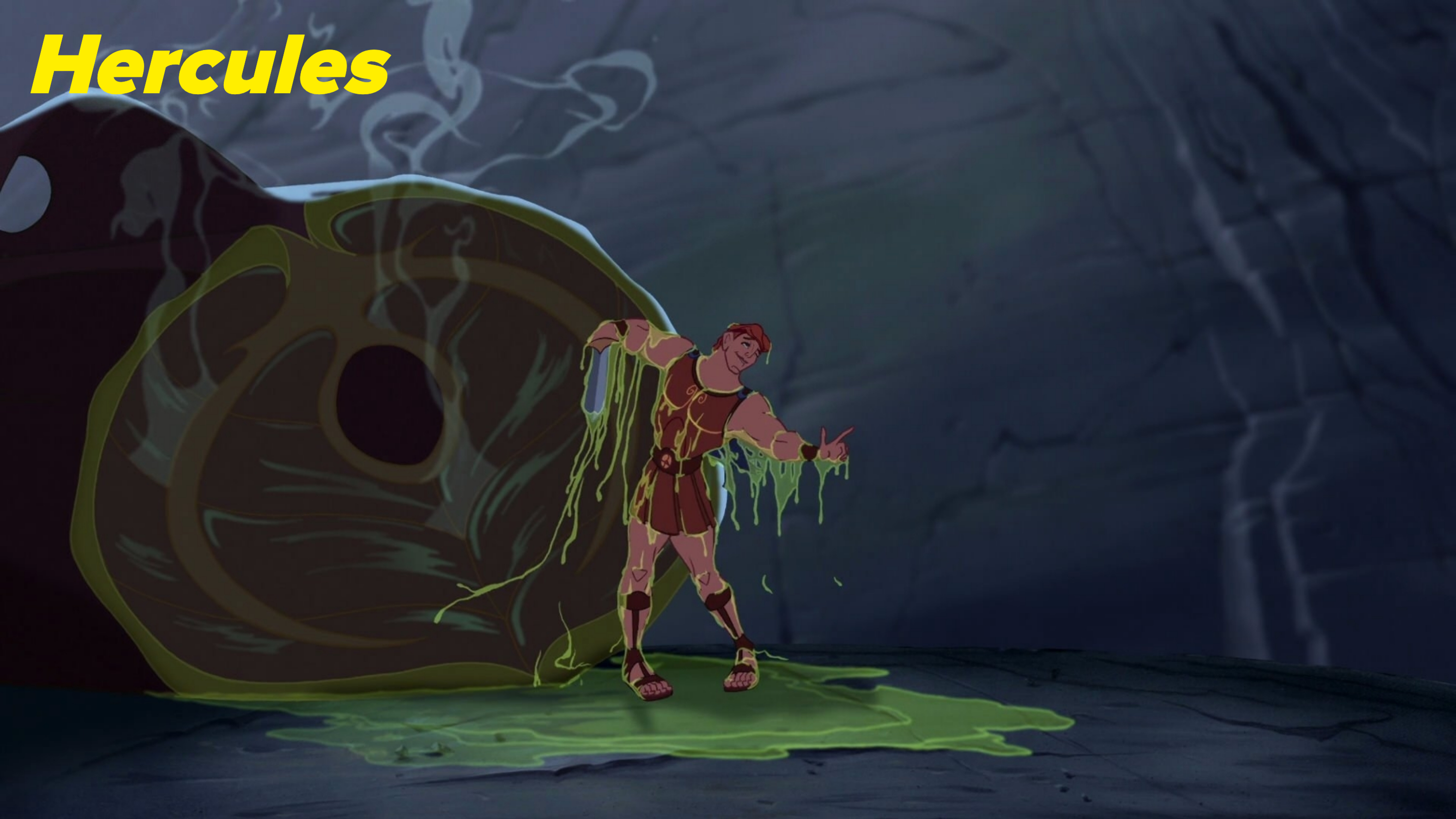 Hercules covered in green slime, struggling to hold up a large, heavy rock inside a cave