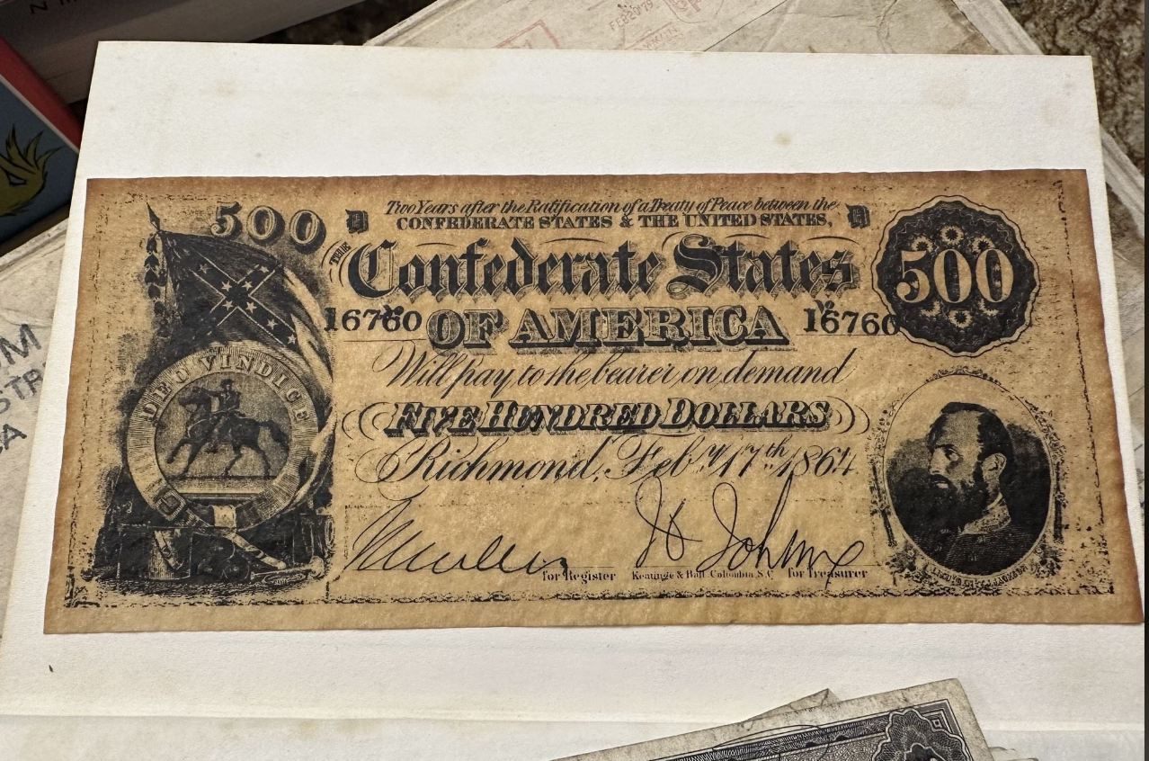 A Confederate States of America $500 bill dated Feb. 17, 1864, featuring a portrait of Stonewall Jackson, signatures, and intricate designs
