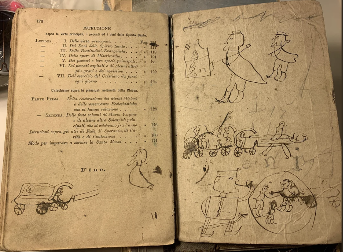 Open vintage book with Italian text on the left page and hand-drawn sketches of children playing with toy vehicles on the right page