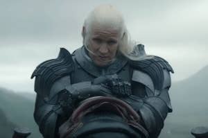 Matt Smith as Daemon Targaryen, wearing dark medieval armor, from the TV series House of the Dragon