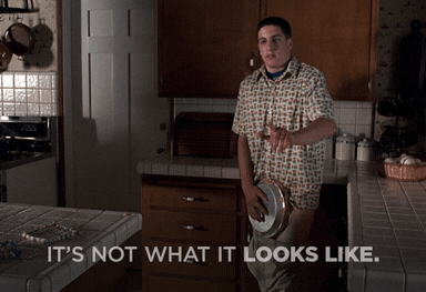 Jason Biggs stands in a kitchen holding a pie, with the text &quot;It's not what it looks like.&quot;