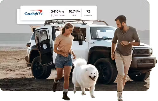 Anna and Dave walk their dog near a white SUV; Capital One offers a $416/month auto loan, 10.74% APR, $1000 down, for 72 months
