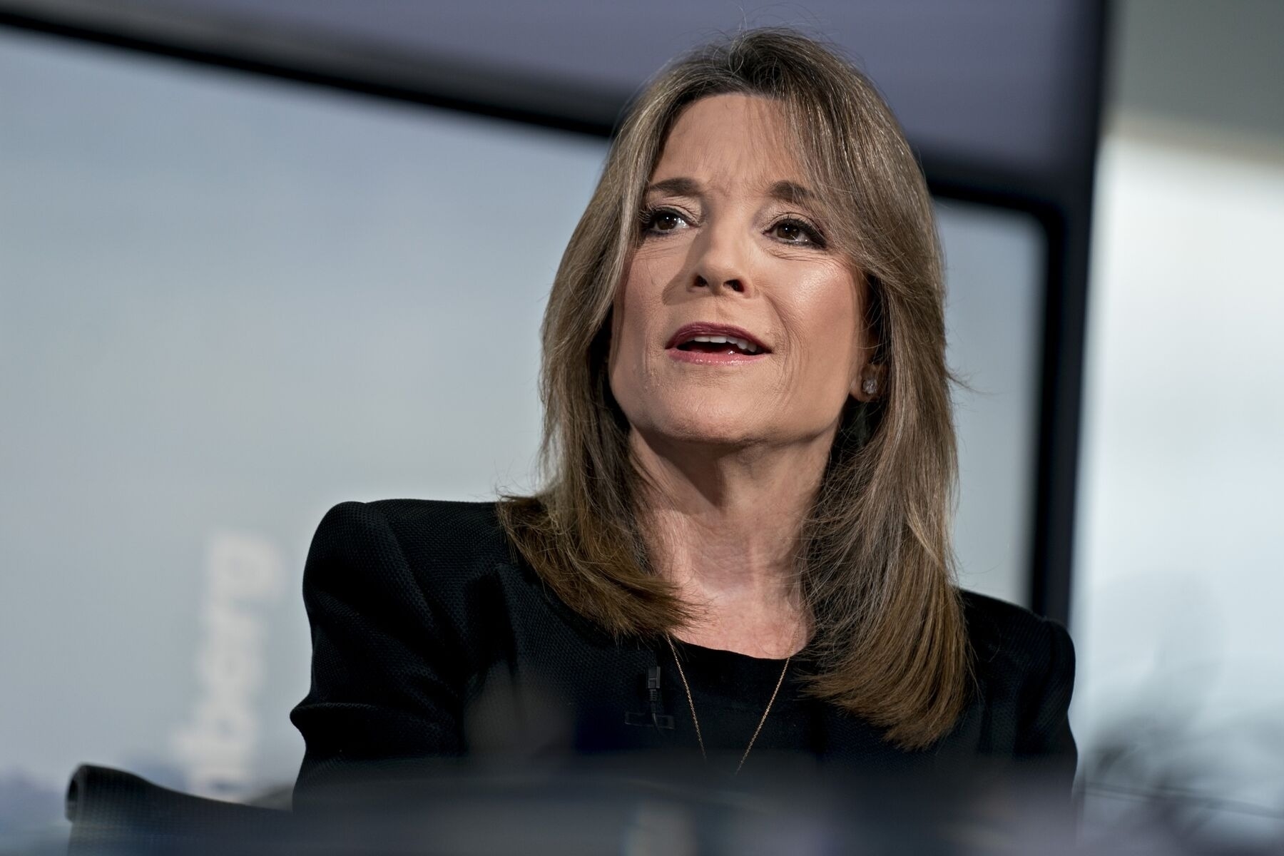 Marianne Williamson speaking at an event