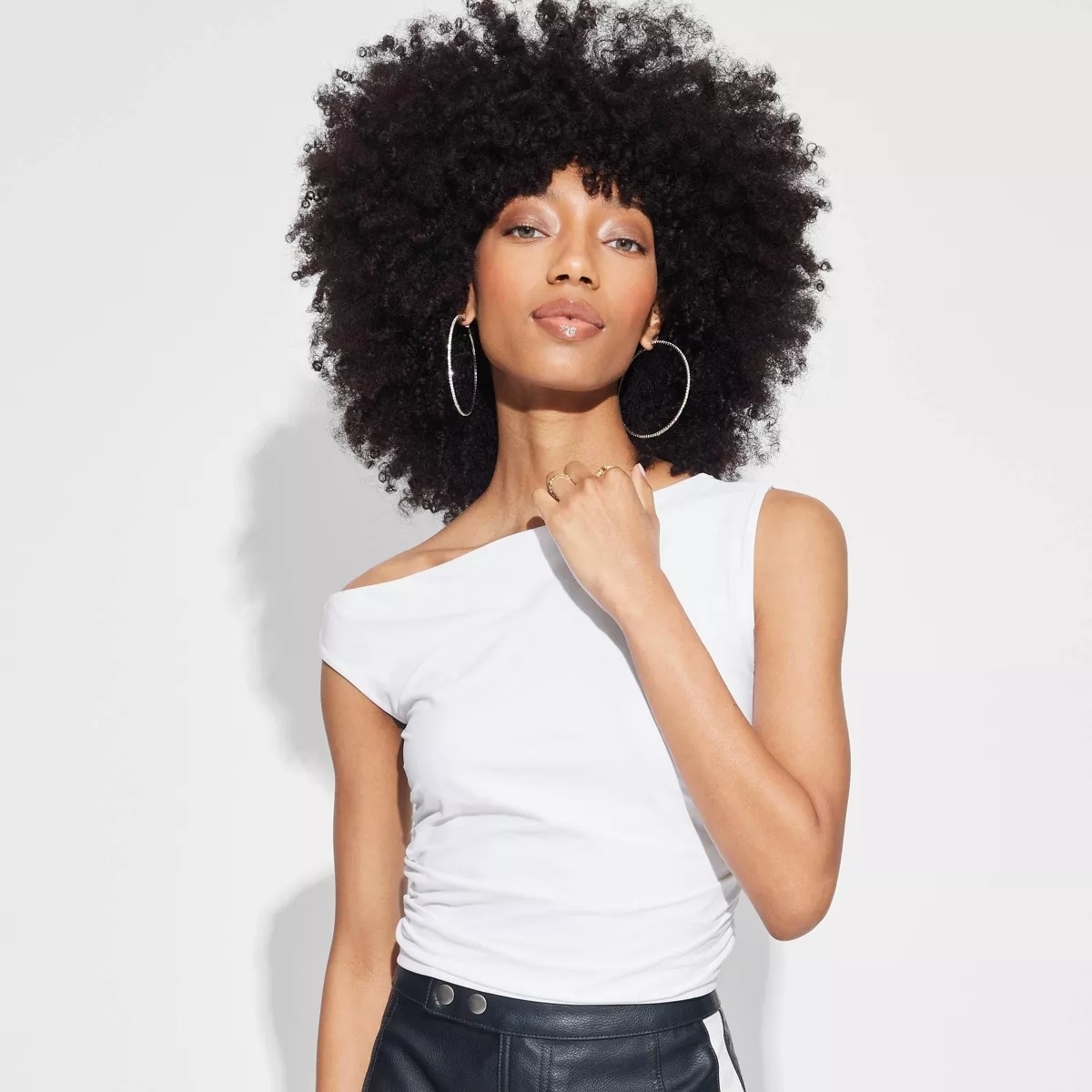 A model wearing an off-shoulder top