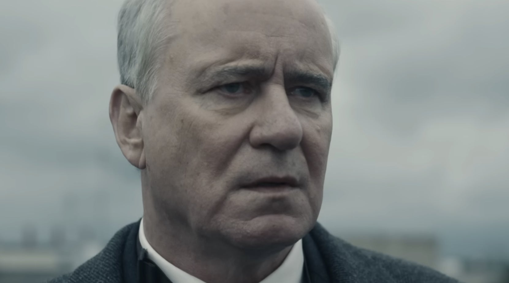 Stellan Skarsgård with a serious expression in a scene from "Chernobyl"