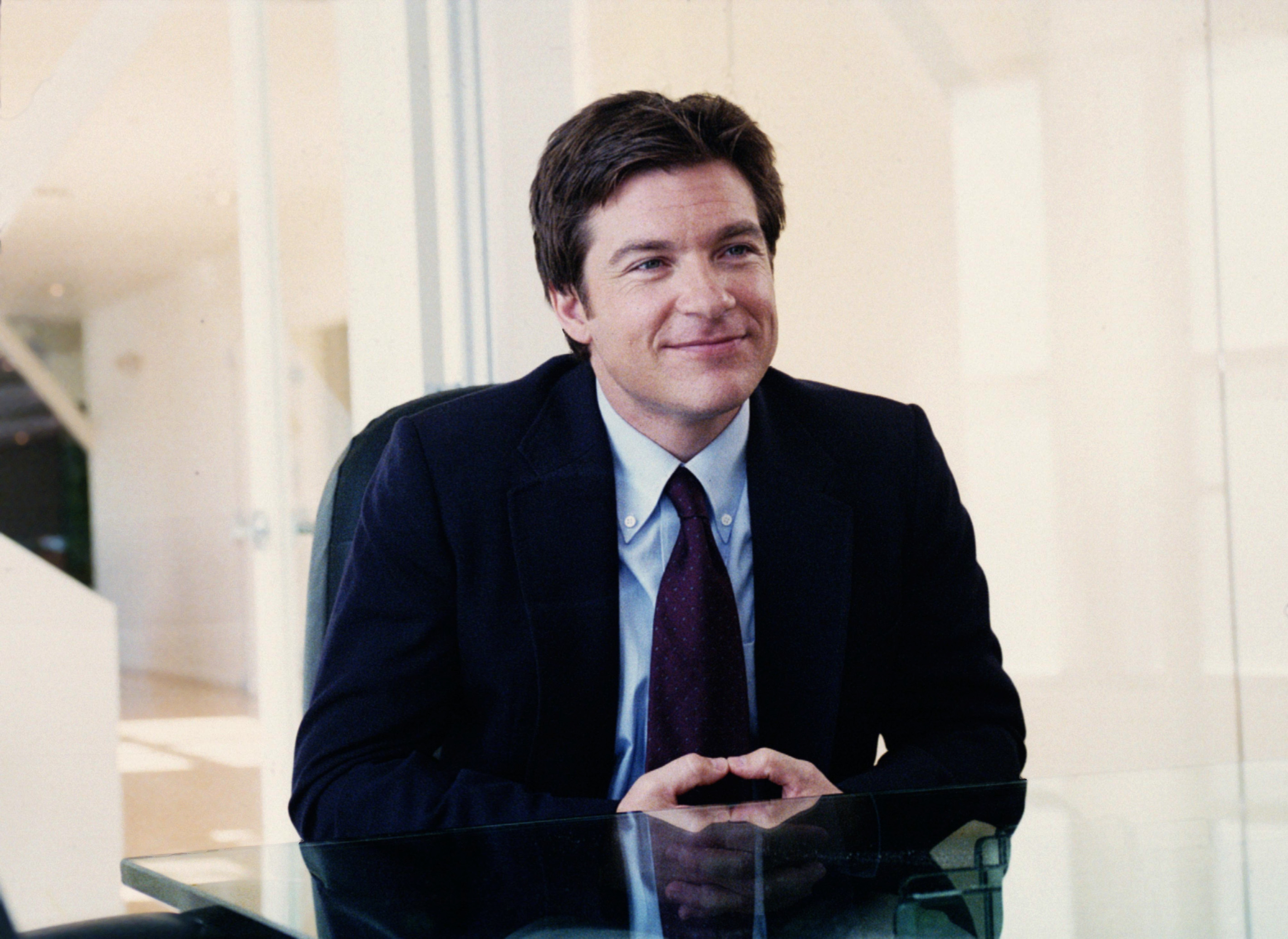 Jason Bateman in a suit and tie in a scene from "Arrested Development"
