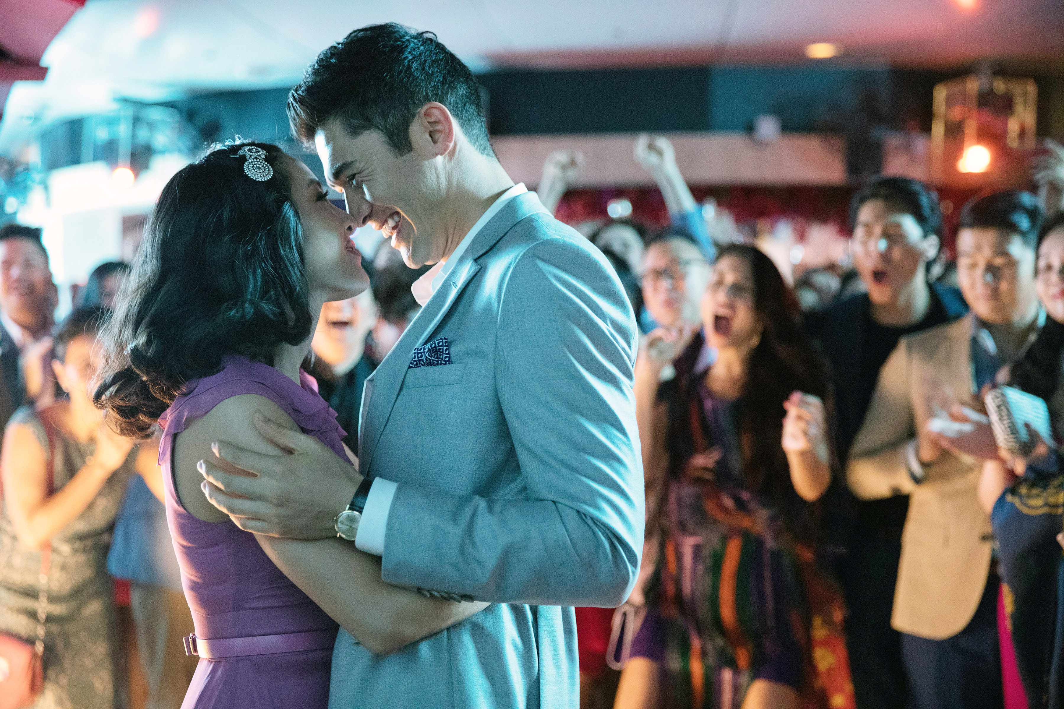 Constance Wu and Henry Golding hugging in a scene from &quot;Crazy Rich Asians&quot;