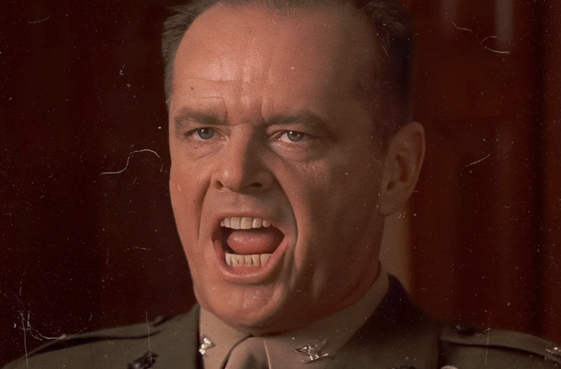Jack Nicholson, in military uniform, delivers an intense speech with a fierce expression