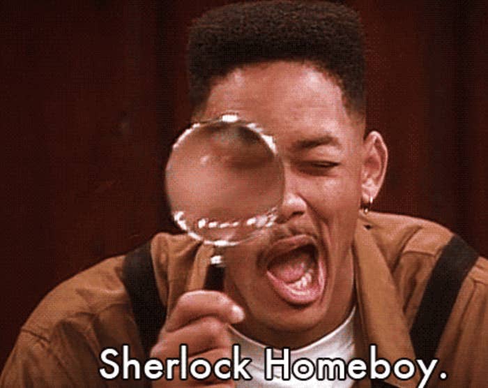 Will Smith comically looks through a magnifying glass with the caption "Sherlock Homeboy."