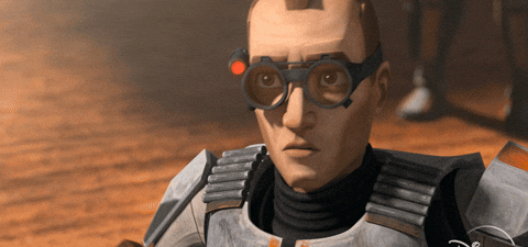 Tech, a character from Star Wars: The Bad Batch, is seen in this animated scene wearing tech-enhanced goggles and armor, from the show on Disney+