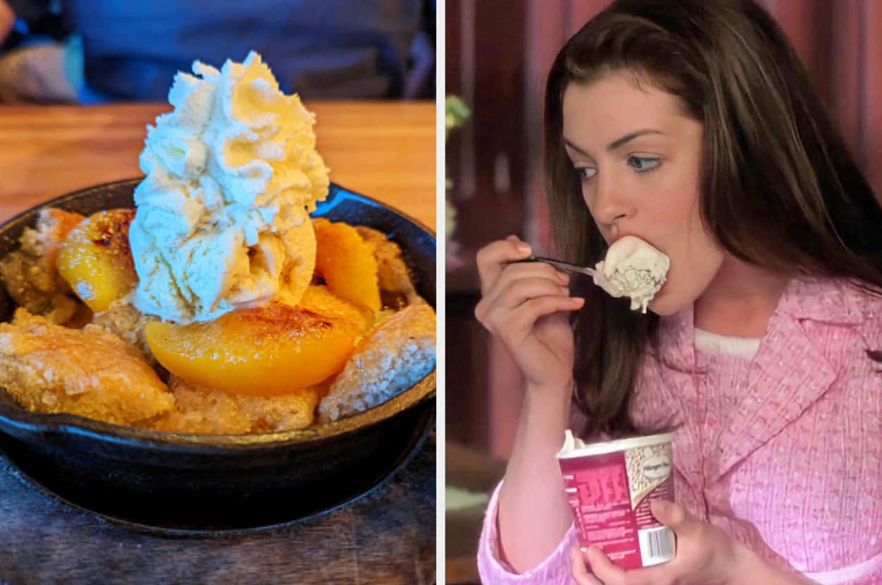 A black bowl filled with peach cobbler topped with ice cream. Anne Hathaway is beside it, eating ice cream from a tub with a spoon