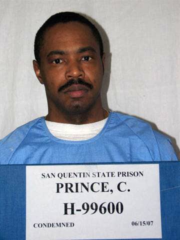 A man identified as "Prince, C." wearing a blue uniform, is photographed holding a sign that reads "San Quentin State Prison, Prince, C., H-99600, Condemned, 06/15/07"