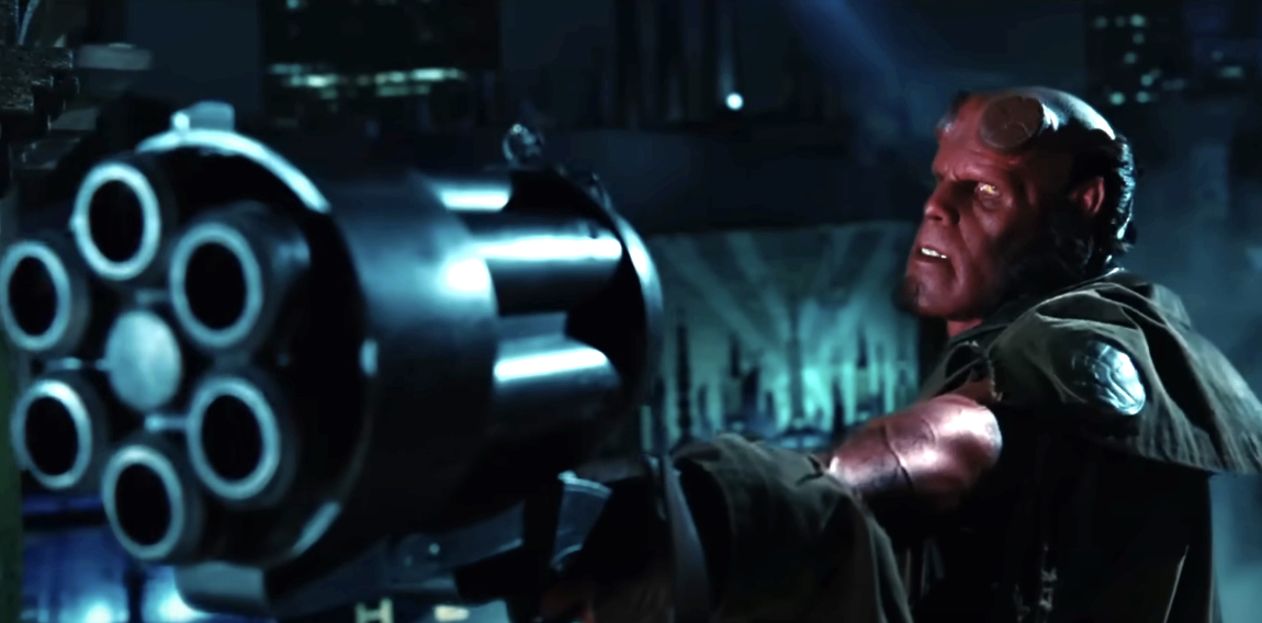 Ron Perlman as Hellboy, an extraterrestrial superhero, aims a large firearm in an intense scene from the movie "Hellboy." His character's horns are sawed off