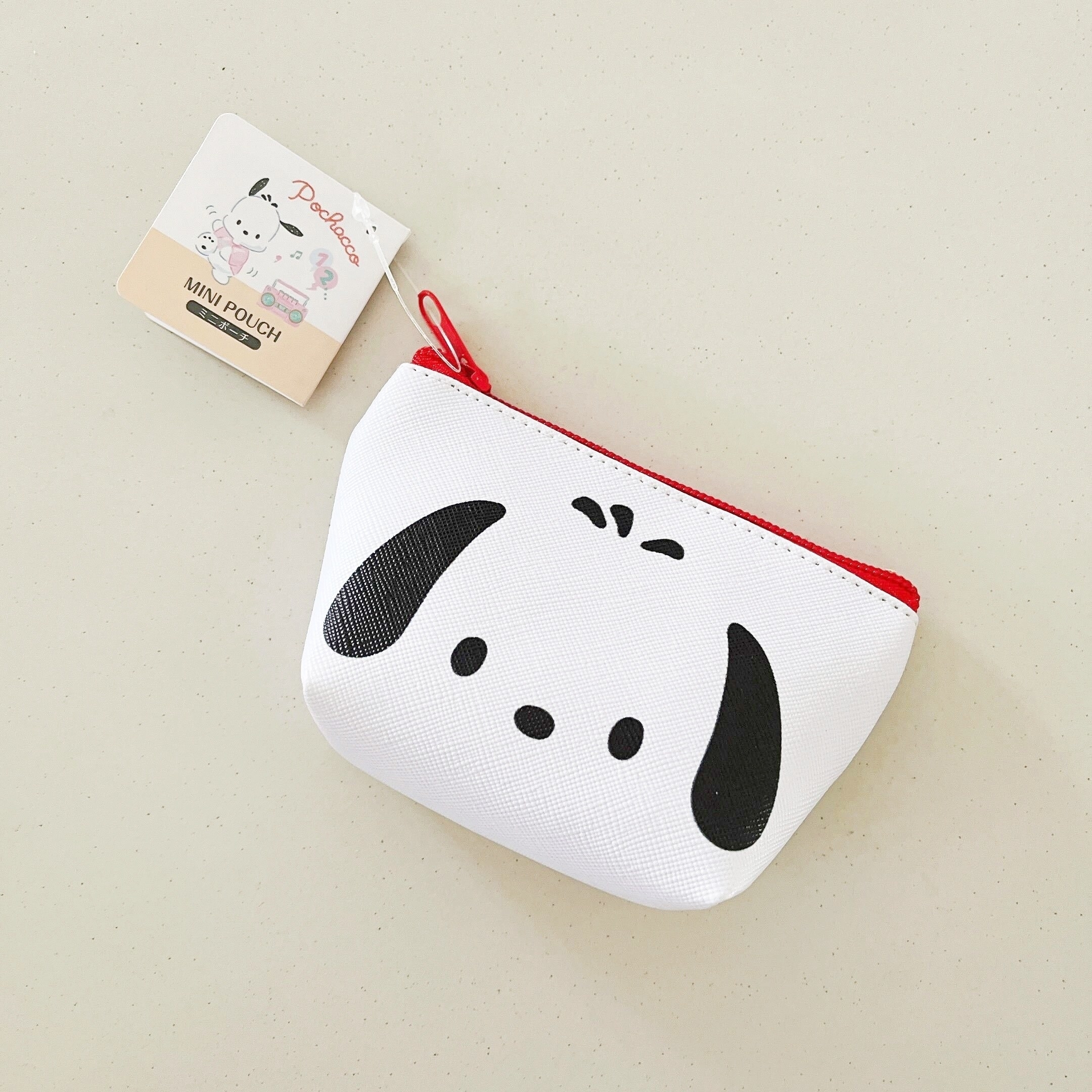 DAISO（ダイソー）のおすすめポーチ「ミニポーチ（舟形）ポチャッコ フェイス」