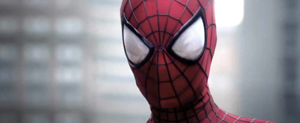 Close-up of Spider-Man's mask and upper body against a blurred background