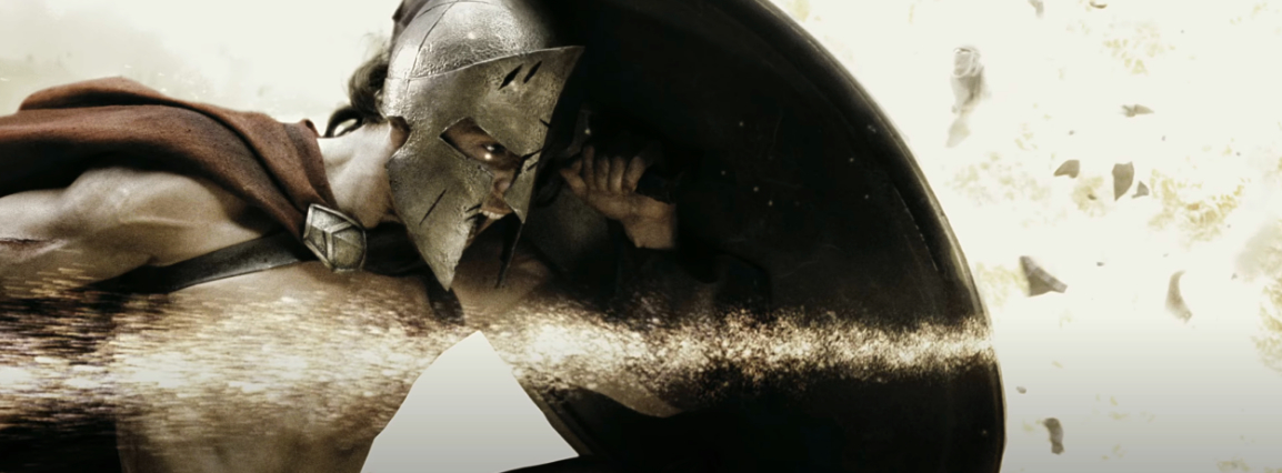 A Spartan helmet and shield, in a battle scene from the movie "300"