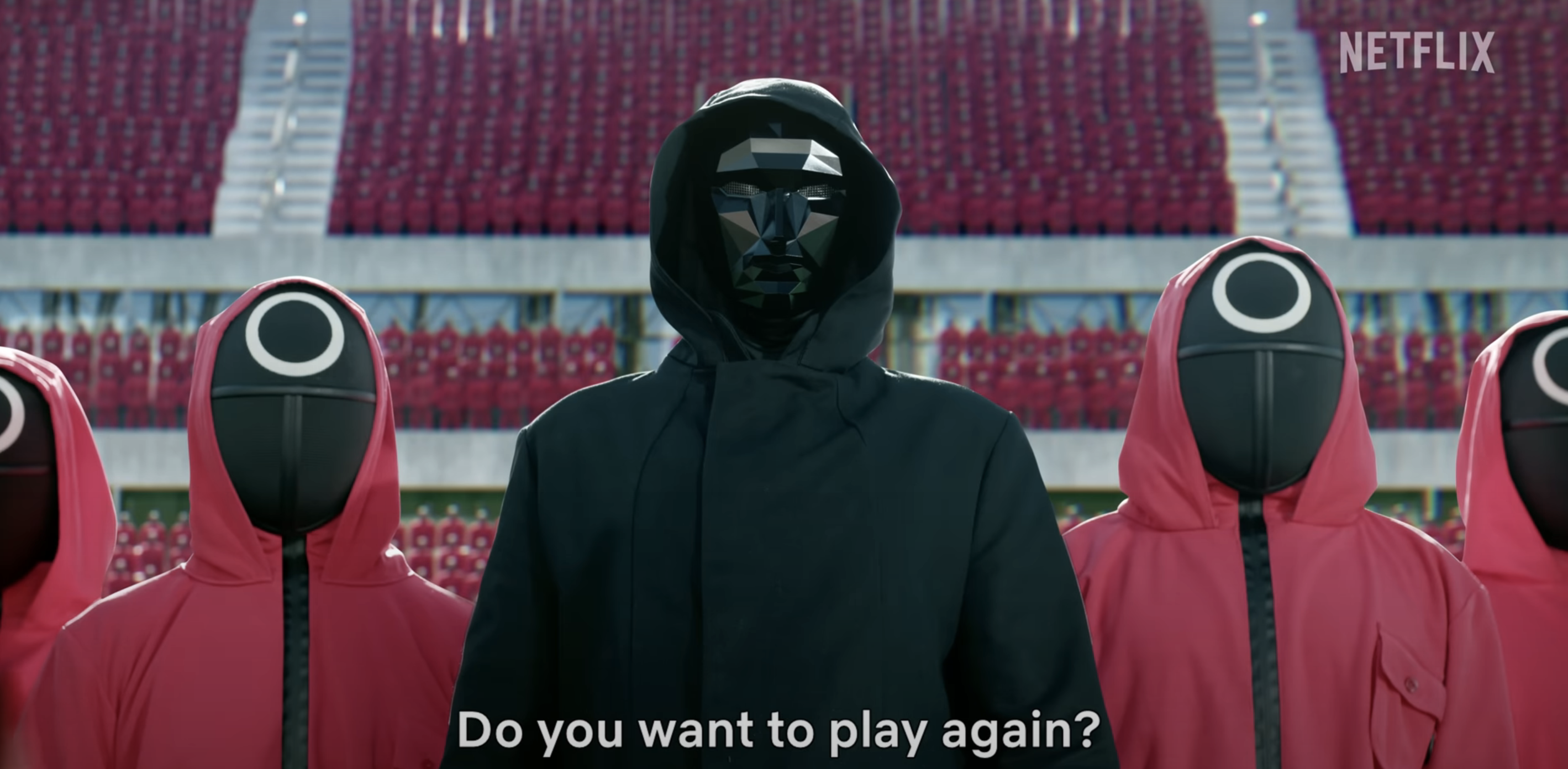 Characters from the TV show "Squid Game" including the Front Man, in a black outfit with a black mask, standing in front of masked guards in red uniforms. Text reads: "Do you want to play again?"