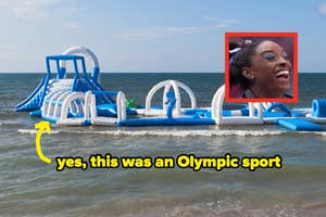 An inflatable obstacle course floats on the ocean with a photo inset of Simone Biles smiling. Text reads, "yes, this was an Olympic sport."
