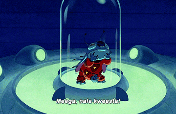 Stitch from the movie "Lilo & Stitch" inside a glass dome, saying "Meega, nala kweesta!"